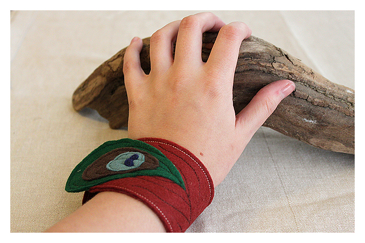 Felt Cuff Orange Peacock - Dark Orange Wrist Warmers, Bracelet, Embroidered with a Peacock Feather